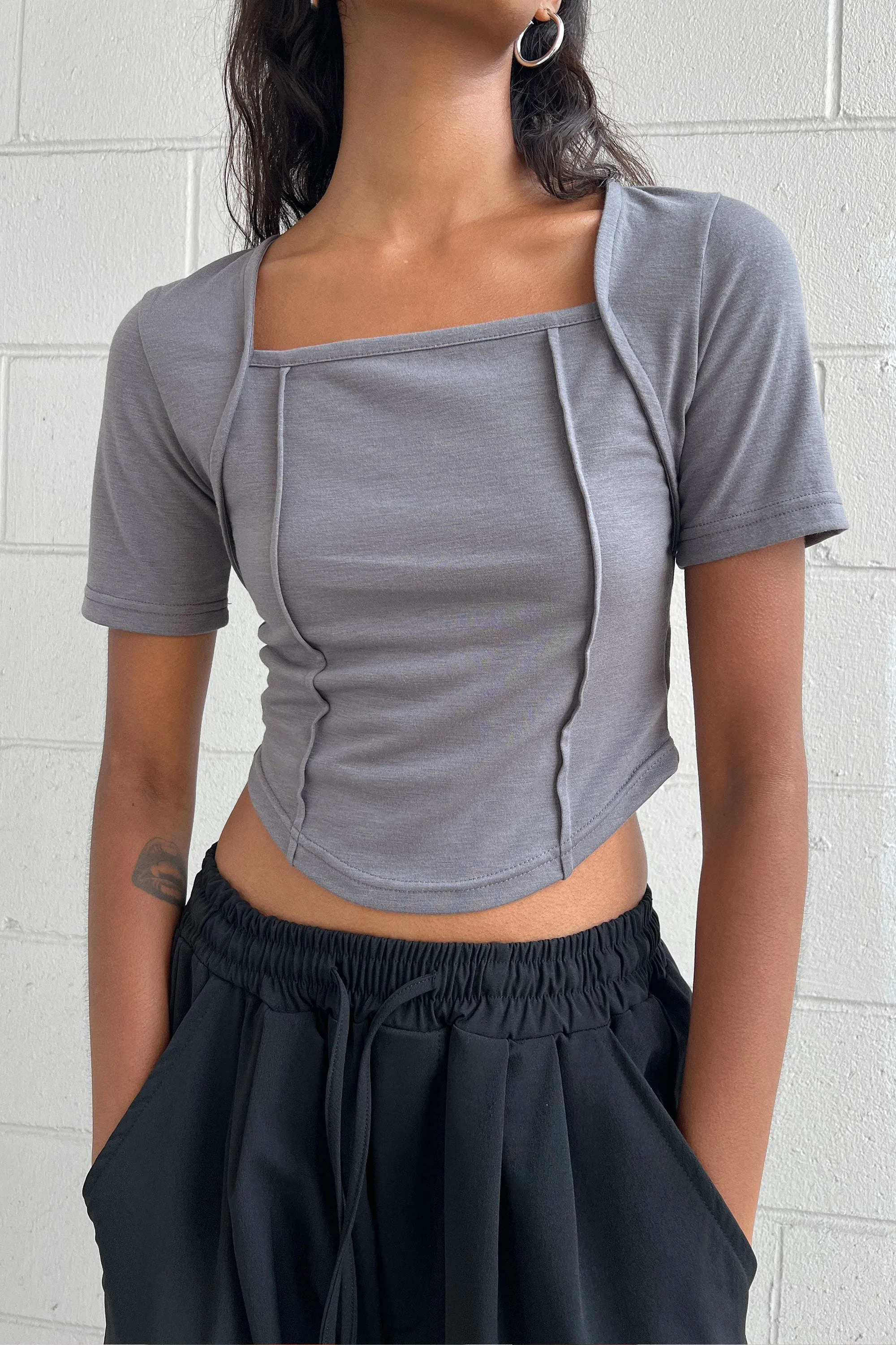 EXPOSED SEAM CROP TOP