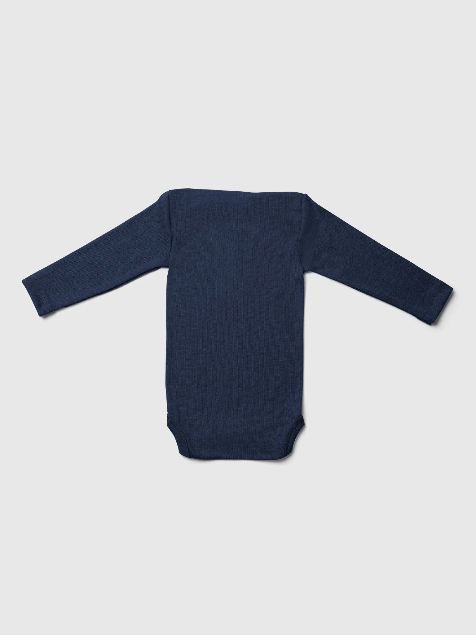 organic merino wool and silk long-sleeved onesie in navy - baby/toddler